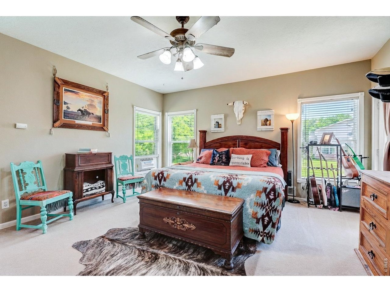 1130 2nd Street Road Eaton, CO 80615 - Photo 11 of 34 Spacious primary bedroom.