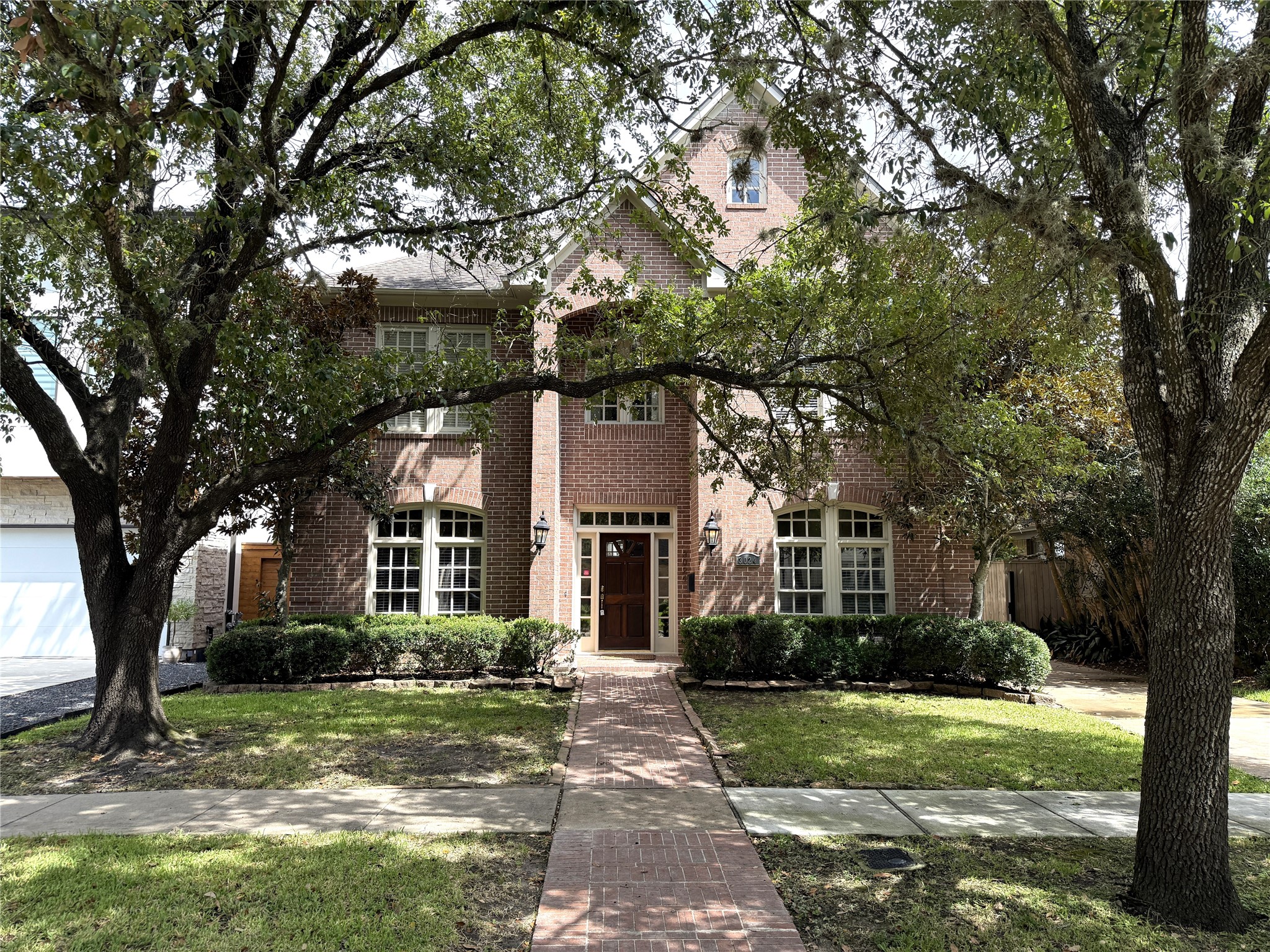 3024 Rice Boulevard Houston, TX 77005 - Photo 1 of 38 A brick sidewalk leads to the front door of this classy home, found on one of the most beautiful and sought after streets in West University