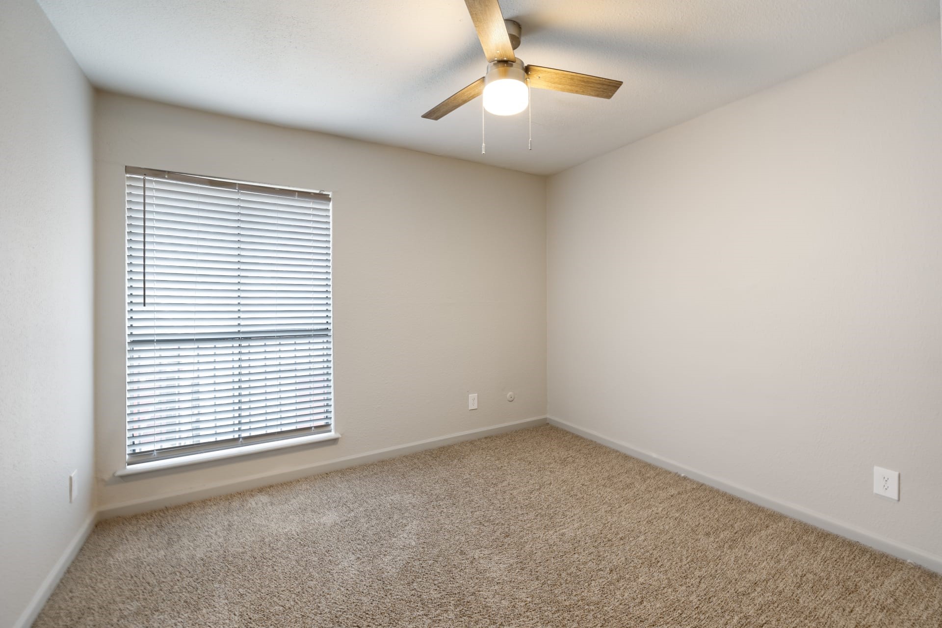 8701 Town Park Drive, Unit 362322 Houston, TX 77036 - Photo 19 of 20 an empty room with a window and fireplace