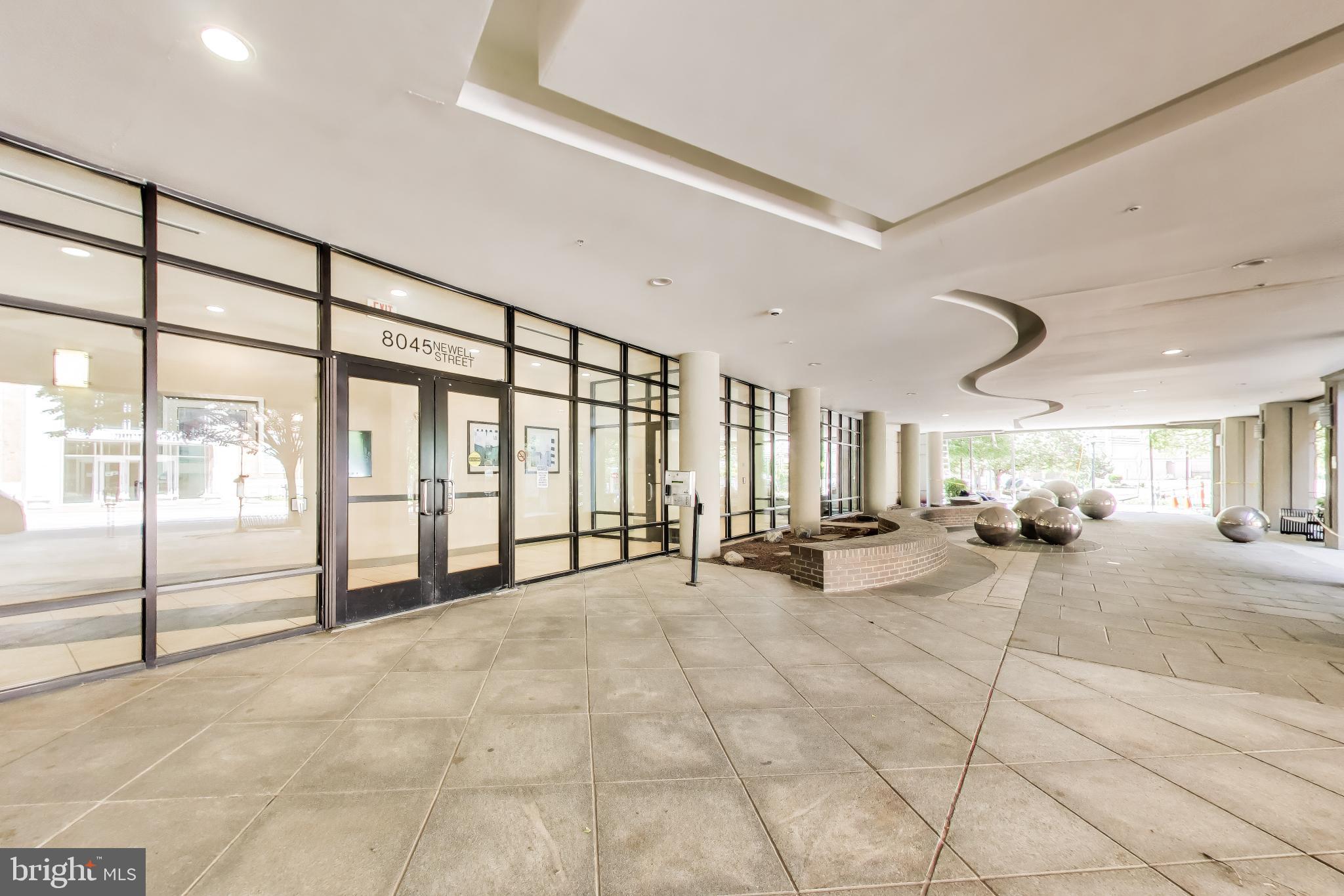 8045 Newell Street, Unit 118 Silver Spring, MD 20910 - Photo 4 of 39 Exterior Lobby