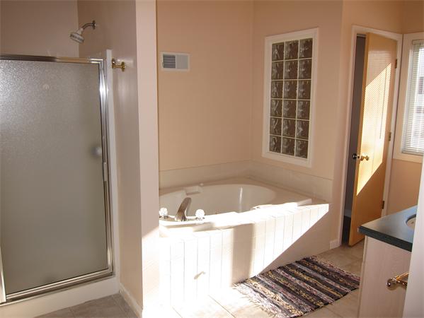 45 Half Crown Circle, Unit 45 Ashland, MA 01721 - Photo 13 of 19 a bathroom with a tub a sink and a window