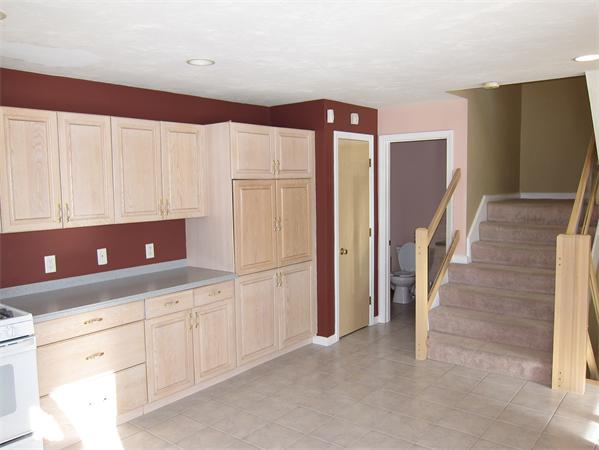 45 Half Crown Circle, Unit 45 Ashland, MA 01721 - Photo 18 of 19 a kitchen with cabinets and a refrigerator