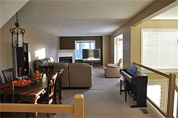 45 Half Crown Circle, Unit 45 Ashland, MA 01721 - Photo 2 of 19 a living room with furniture fireplace and a flat screen tv