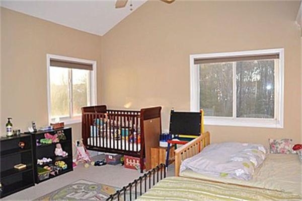 45 Half Crown Circle, Unit 45 Ashland, MA 01721 - Photo 10 of 19 a bedroom with a bed and a window