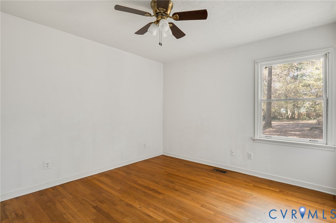 1140 Berryhill Road Henrico, VA 23231 - Photo 16 of 29 Spare room featuring wood finished floors, ceiling