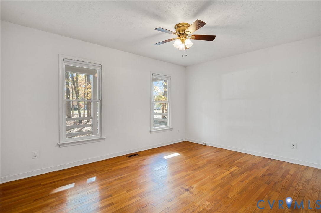 1140 Berryhill Road Henrico, VA 23231 - Photo 18 of 29 Spare room with plenty of natural light, hardwood