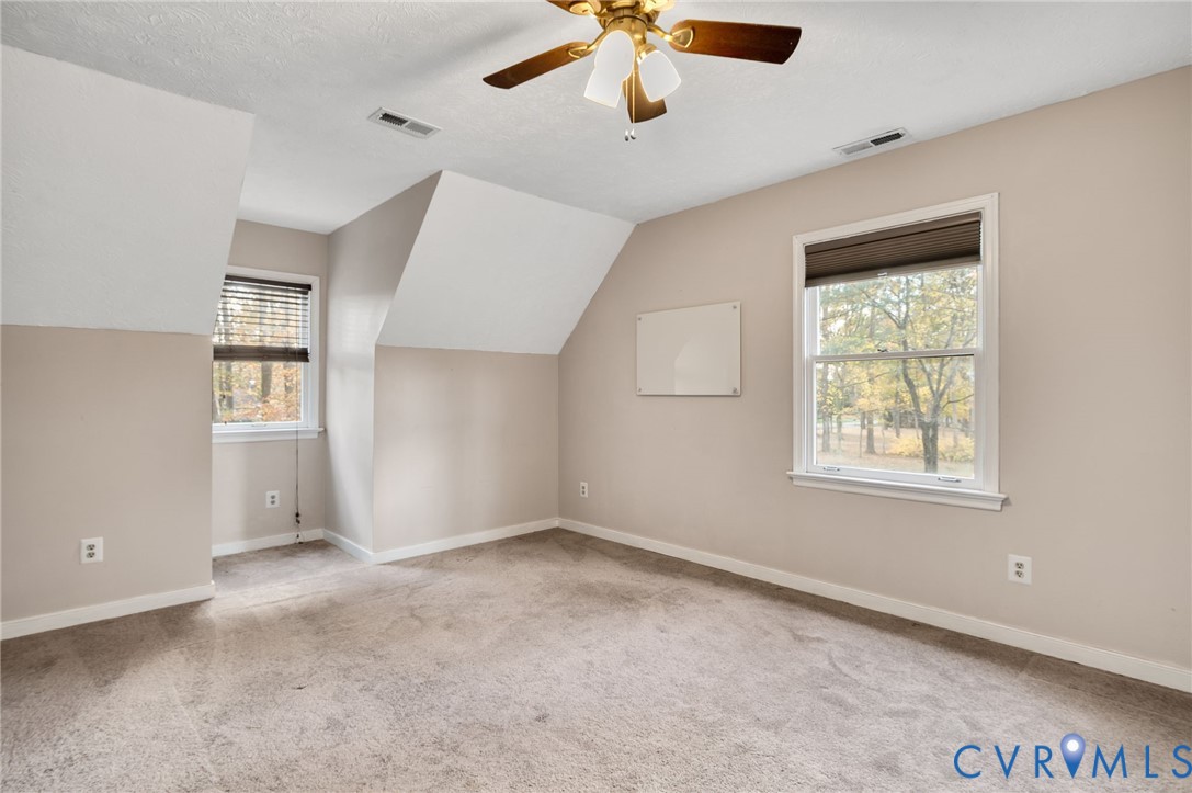 1140 Berryhill Road Henrico, VA 23231 - Photo 20 of 29 Additional living space with light carpet, lofted