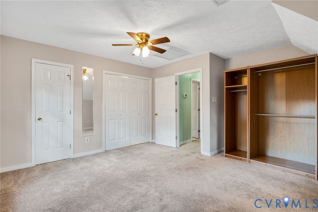 1140 Berryhill Road Henrico, VA 23231 - Photo 21 of 29 Unfurnished bedroom featuring two closets, light c