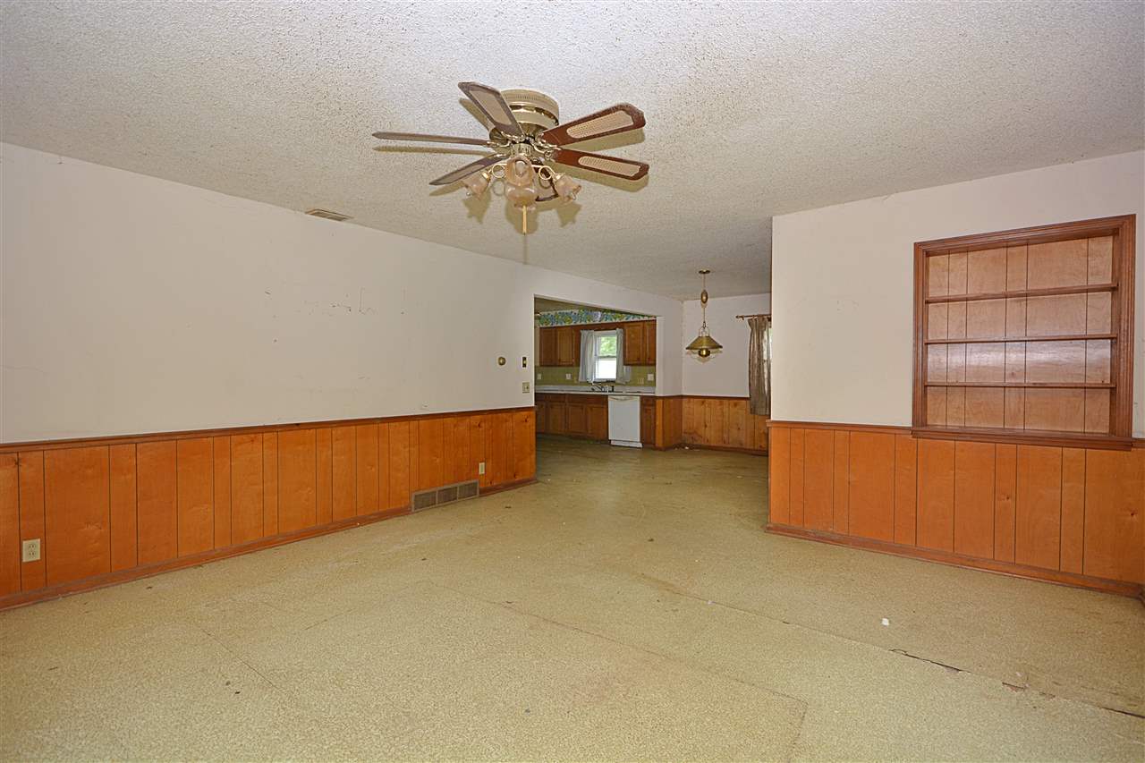 916 Windsor Road Loves Park, IL 61111 - Photo 5 of 14 a view of room with window and cabinet