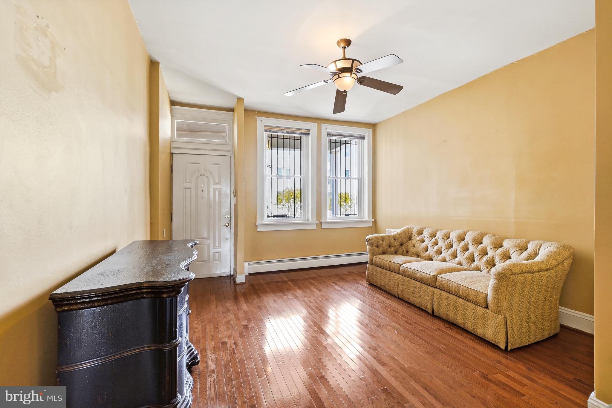 323 W Street Northeast Washington, DC 20002 - Photo 12 of 22 a living room with furniture and wooden floor
