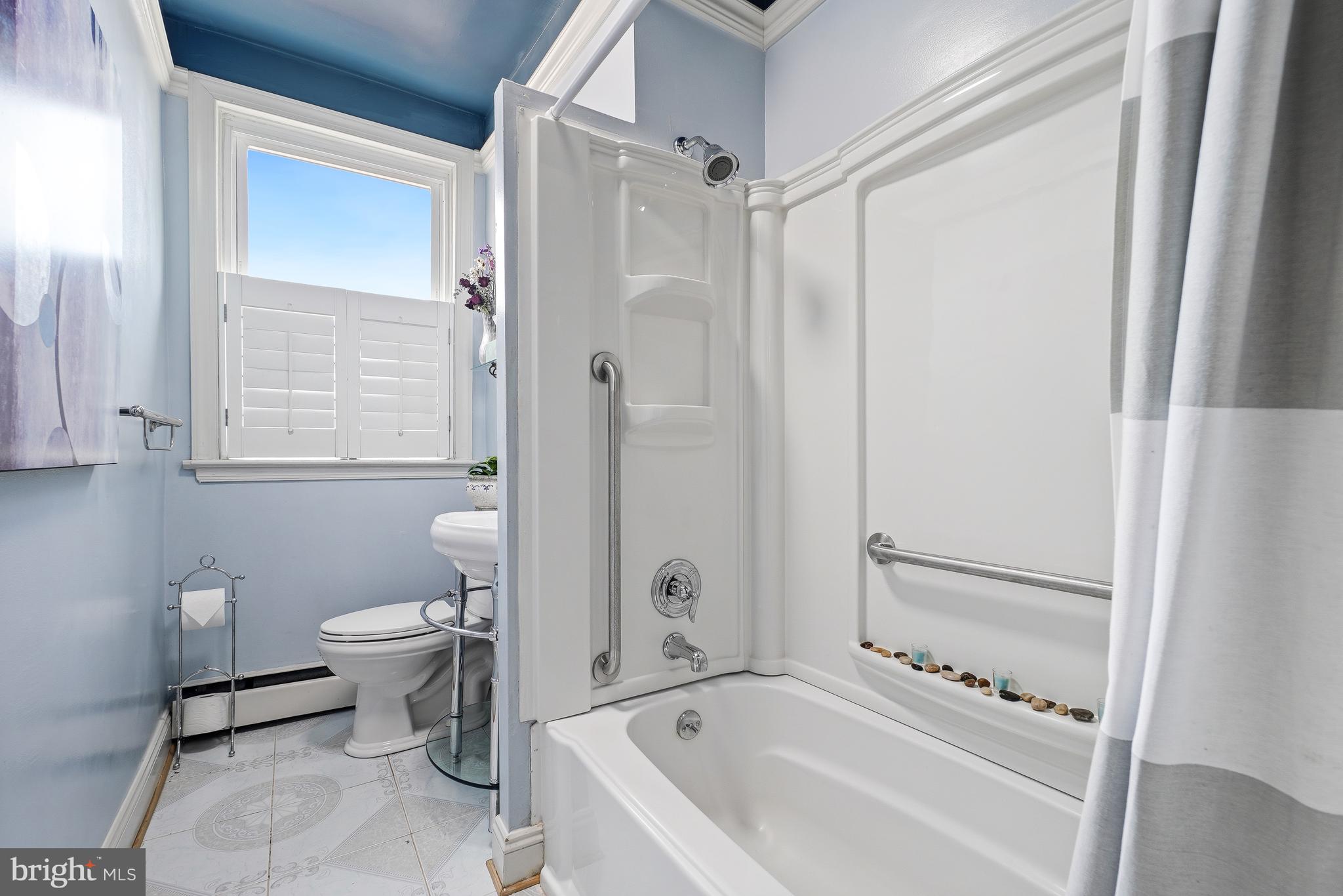 323 W Street Northeast Washington, DC 20002 - Photo 13 of 22 a bathroom with a bathtub and a shower