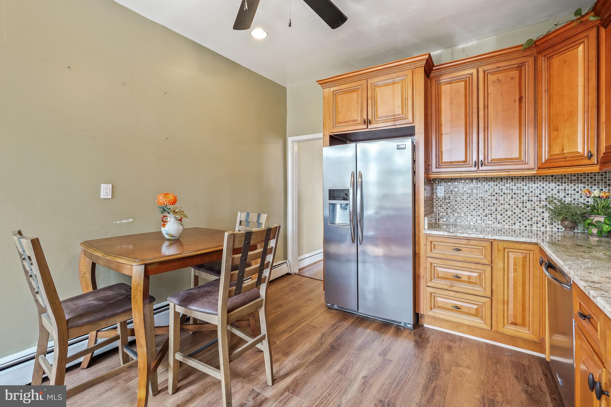 323 W Street Northeast Washington, DC 20002 - Photo 7 of 22 a kitchen with stainless steel appliances granite countertop a refrigerator and microwave