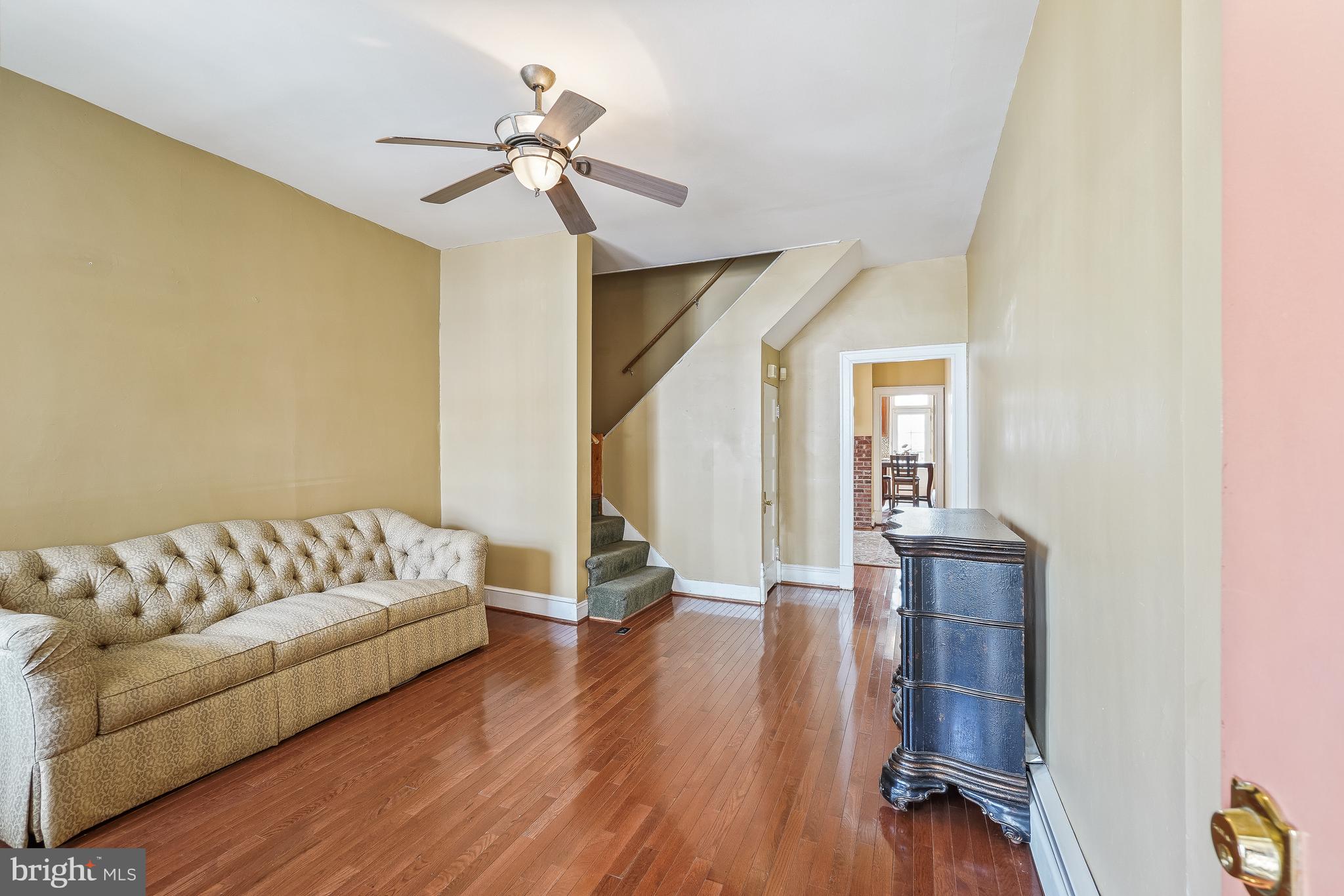 323 W Street Northeast Washington, DC 20002 - Photo 10 of 22 a living room with furniture and a wooden floor