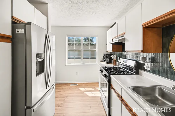 $299,900 | 956 Ada Pl Drive Southeast, Grand Rapids, MI 49546