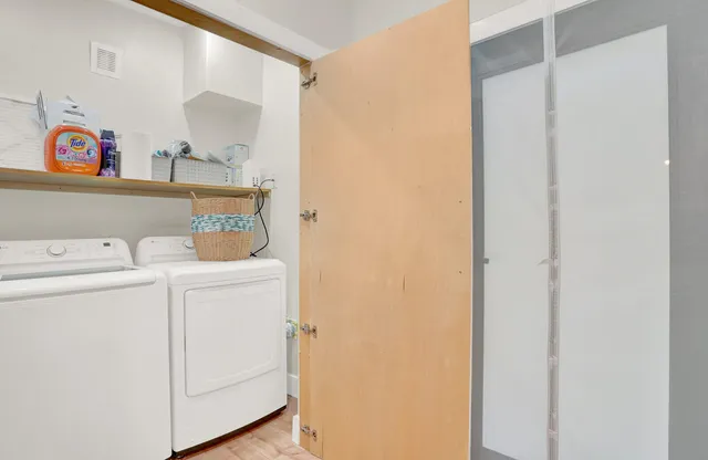 a utility room with dryer and washer