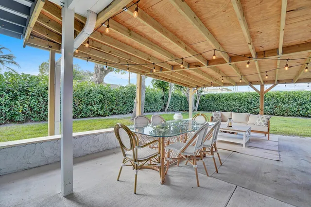 a dining room with furniture and a table and chairs