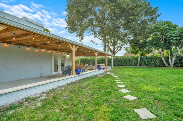 a backyard of a house with a garden