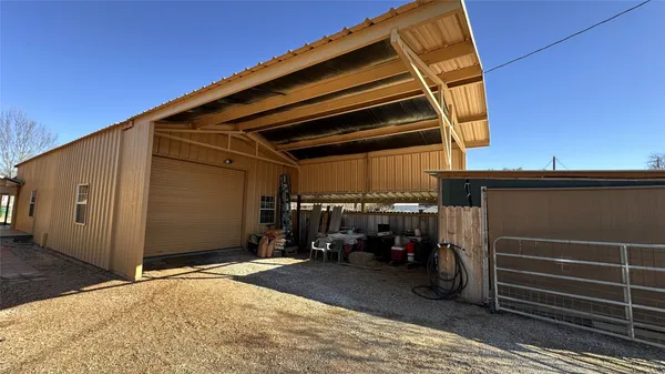 a view of a car garage of a house