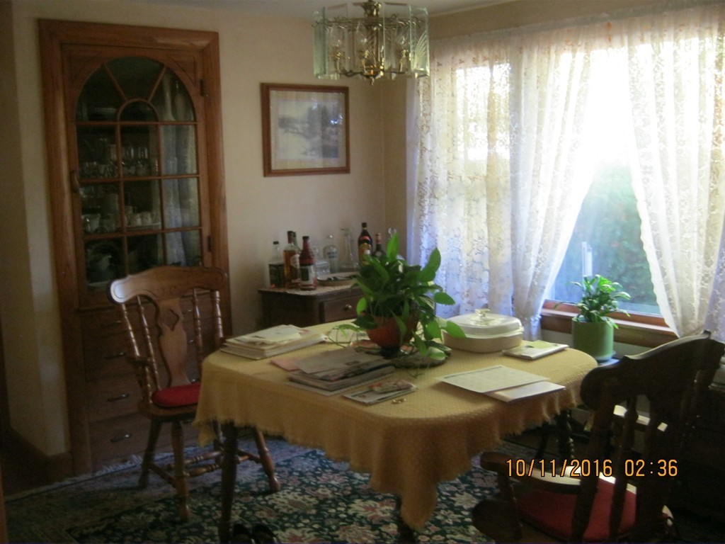 471 Wheeler Road Ashby, MA 01431 - Photo 5 of 22 a view of a dining room with furniture and window