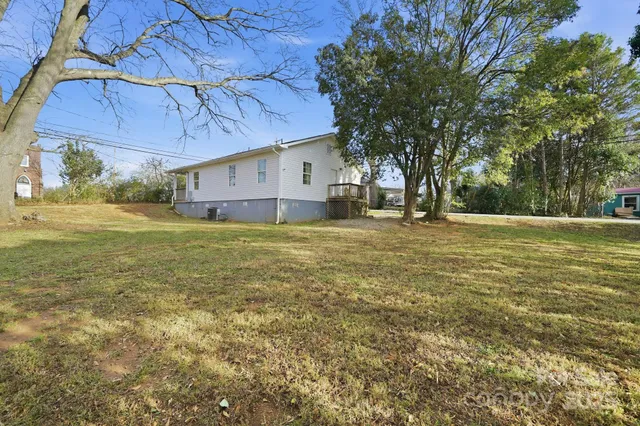 a backyard of a house with lots of green space