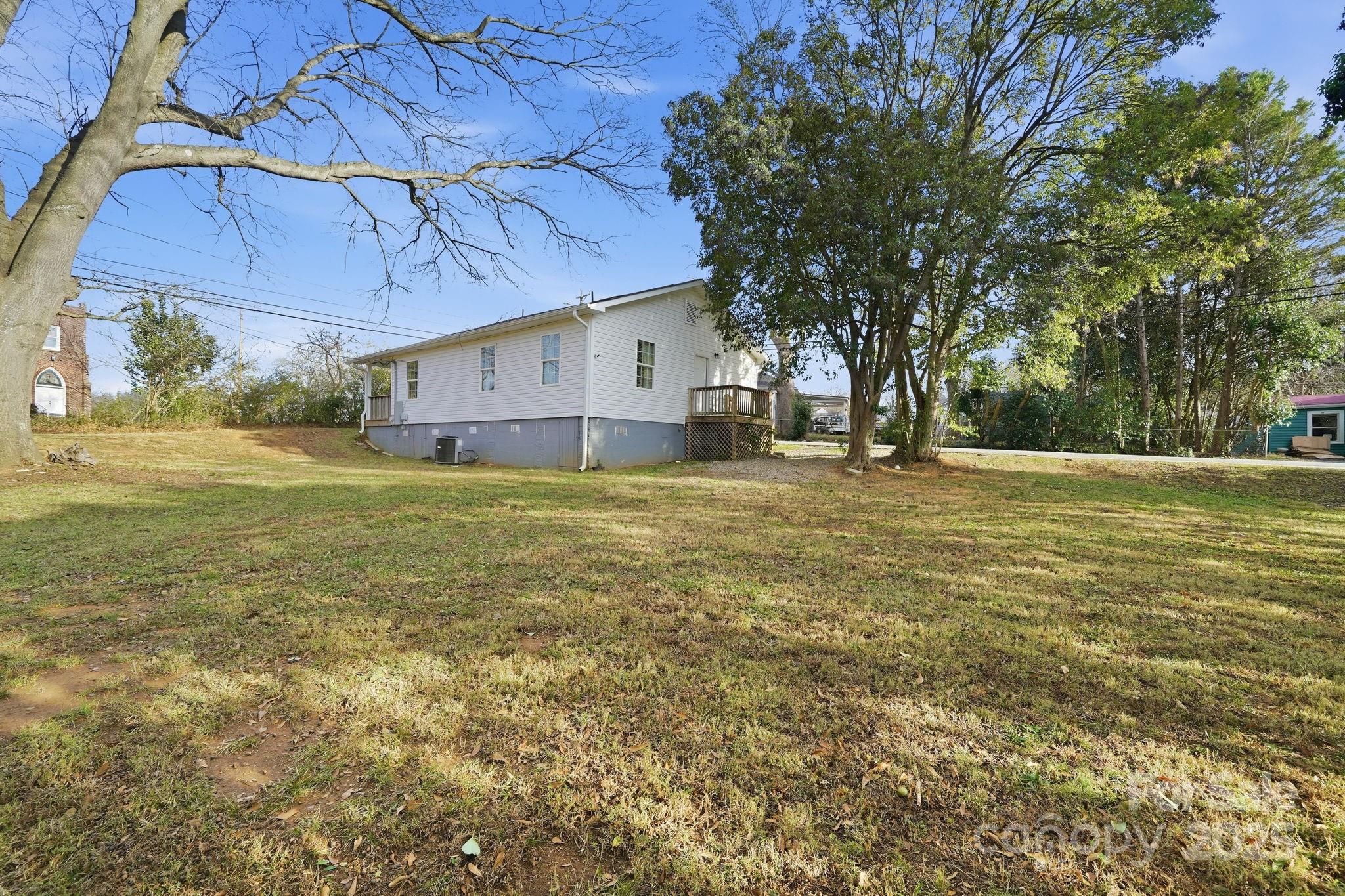 2301 Acme Road Belmont, NC 28012 - Photo 23 of 25 a view of a house with a yard