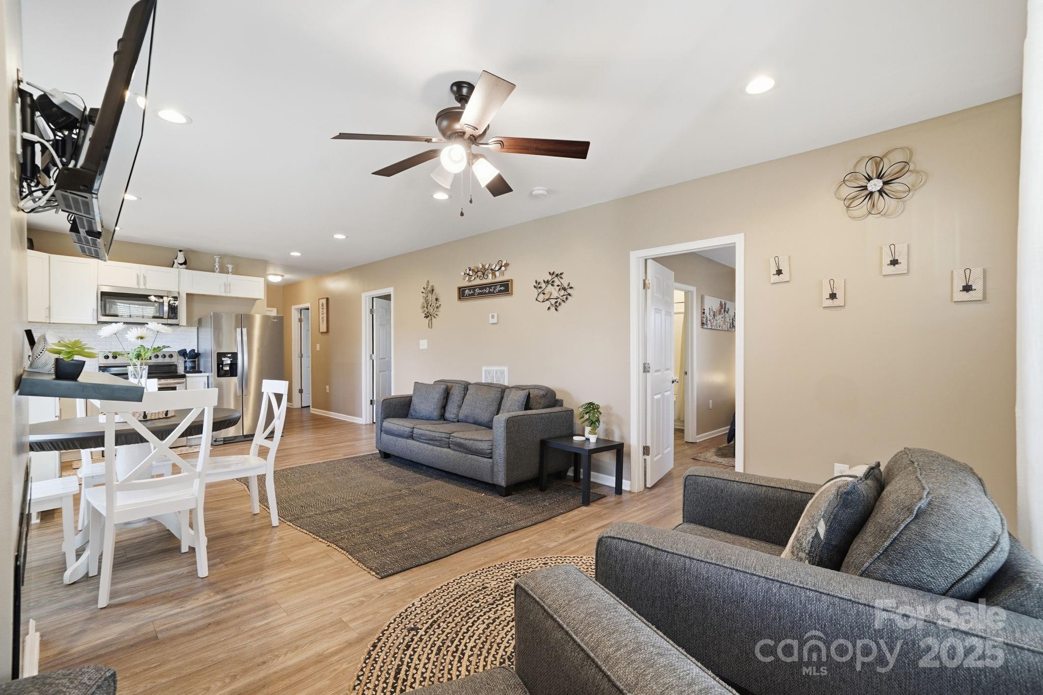 2301 Acme Road Belmont, NC 28012 - Photo 7 of 25 a living room with furniture and wooden floor