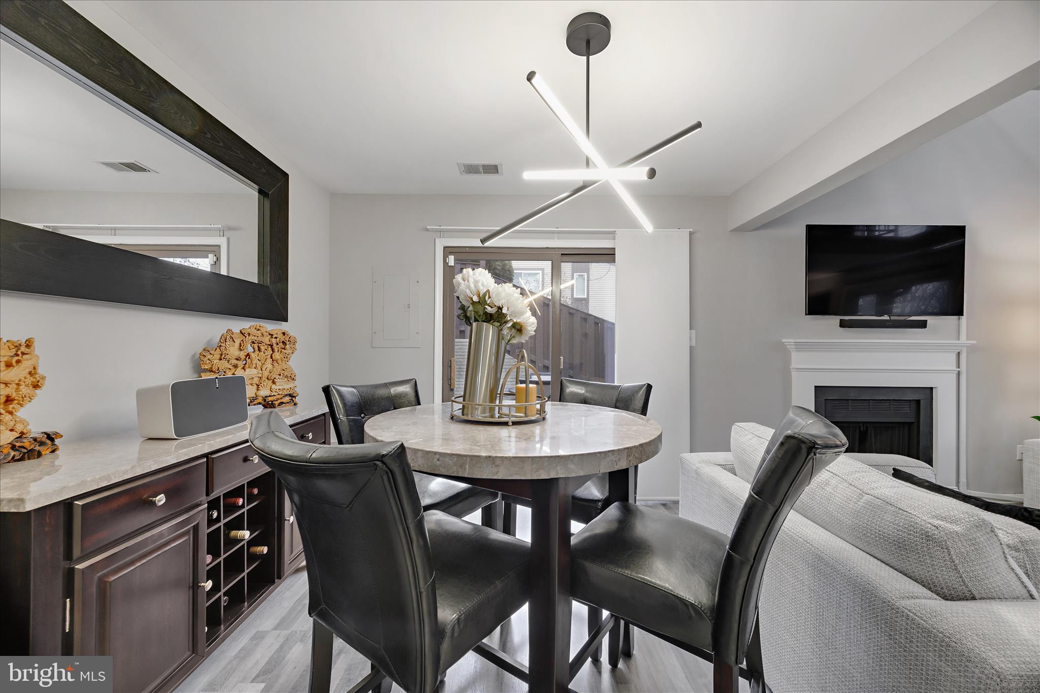 7314 Split Rail Lane Laurel, MD 20707 - Photo 12 of 32 a view of a livingroom with furniture and a flat screen tv