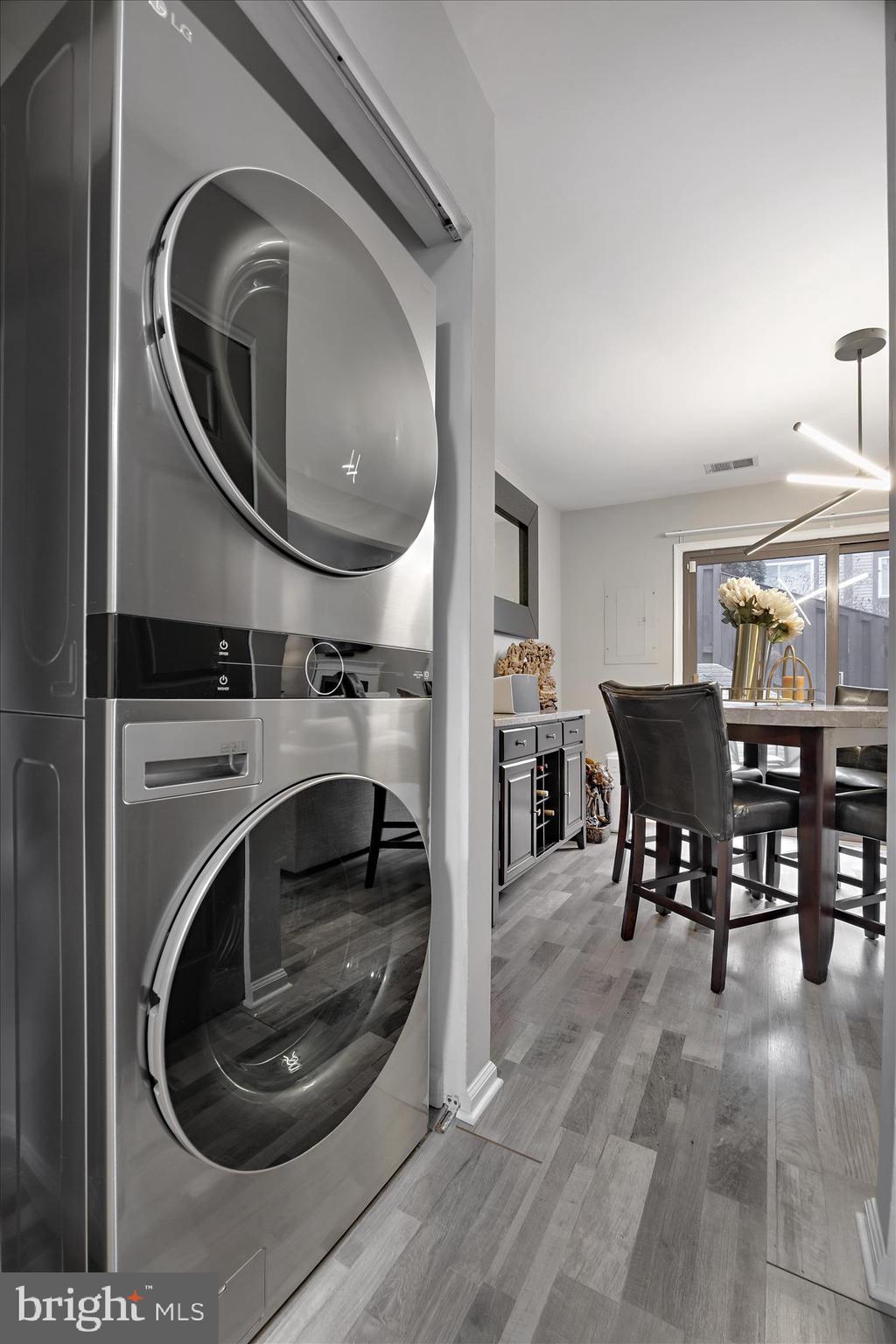 7314 Split Rail Lane Laurel, MD 20707 - Photo 22 of 32 a view of a livingroom with furniture and washing machine