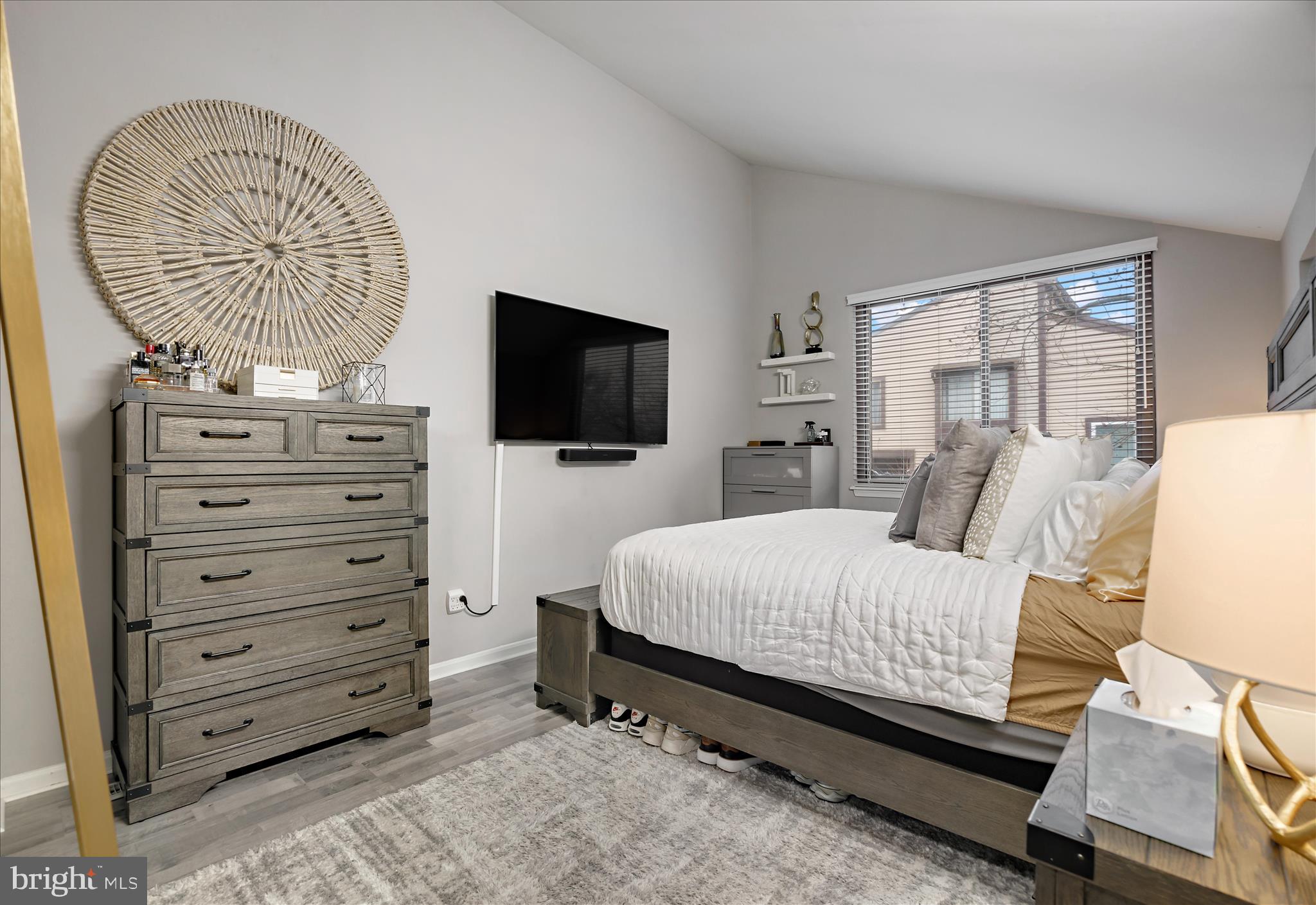 7314 Split Rail Lane Laurel, MD 20707 - Photo 23 of 32 a bedroom with a bed and flat screen tv