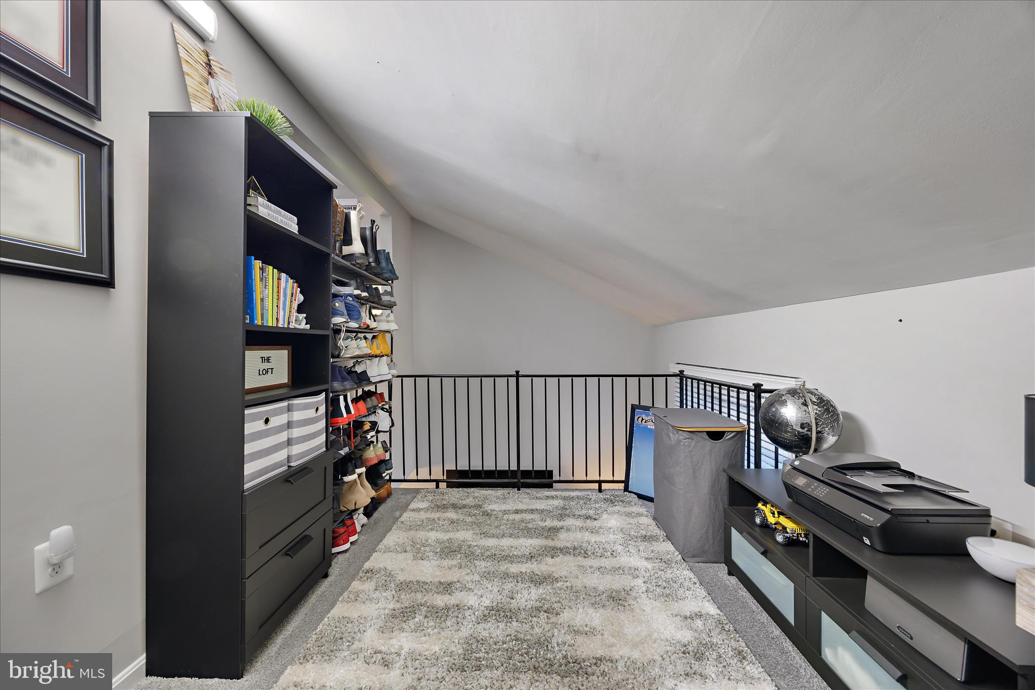 7314 Split Rail Lane Laurel, MD 20707 - Photo 28 of 32 a view of a hallway with workspace and lots of stuff