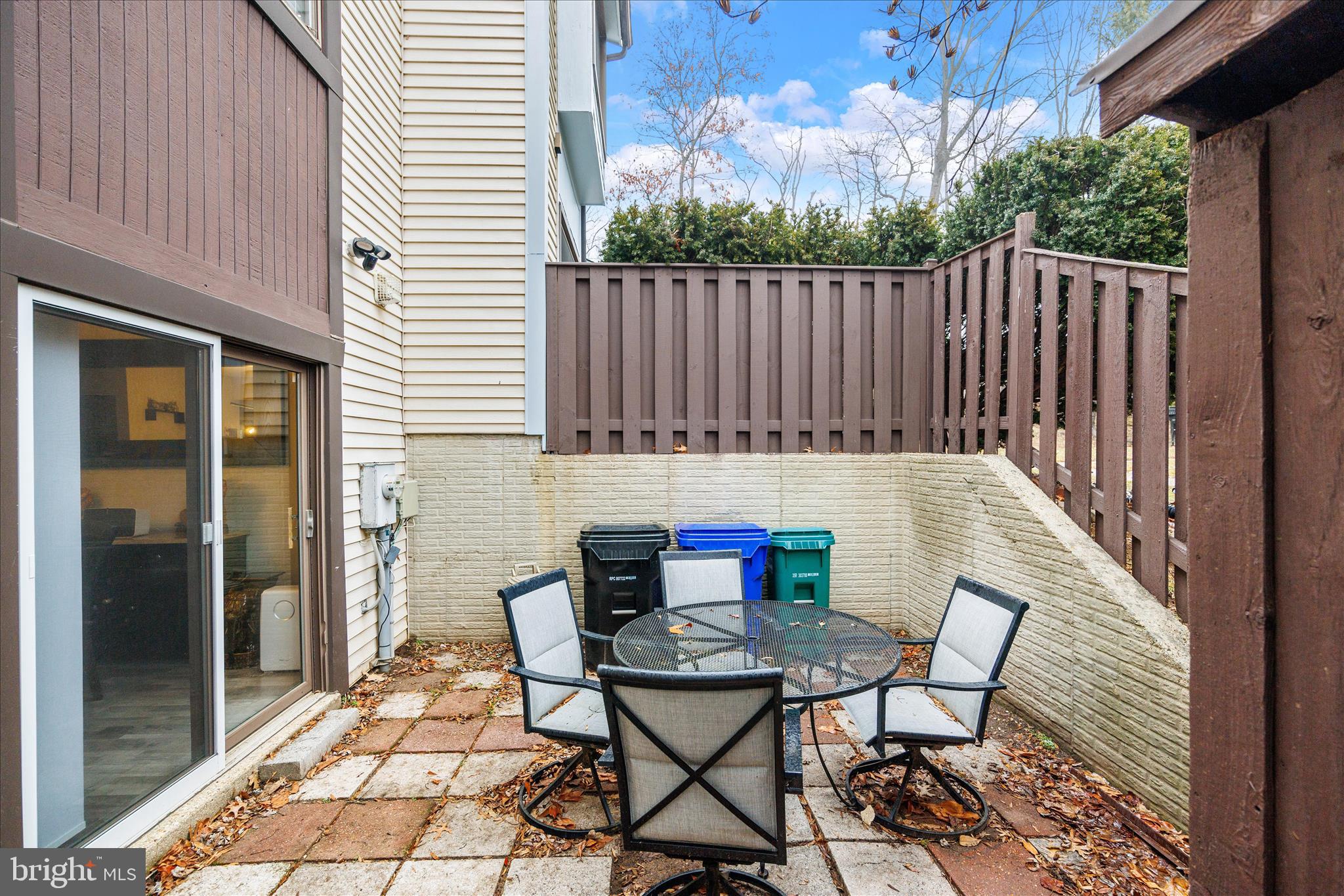 7314 Split Rail Lane Laurel, MD 20707 - Photo 32 of 32 a view of a chairs and table in the balcony