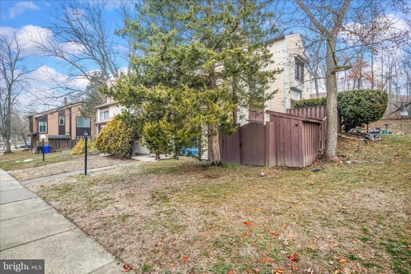 a house with trees in front of it
