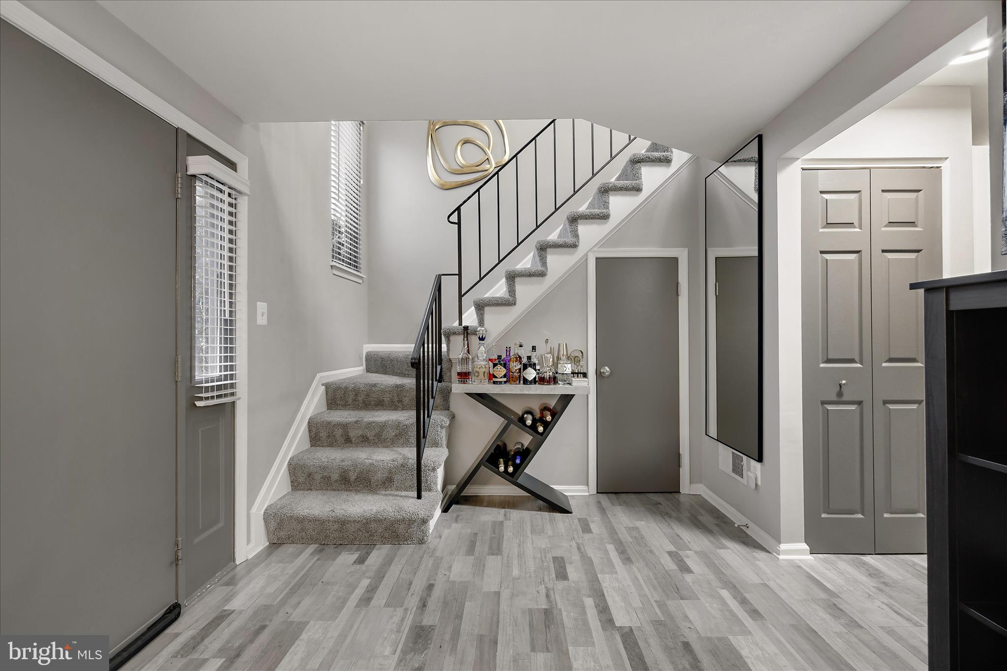 7314 Split Rail Lane Laurel, MD 20707 - Photo 6 of 32 a view of entryway with wooden floor and stairs