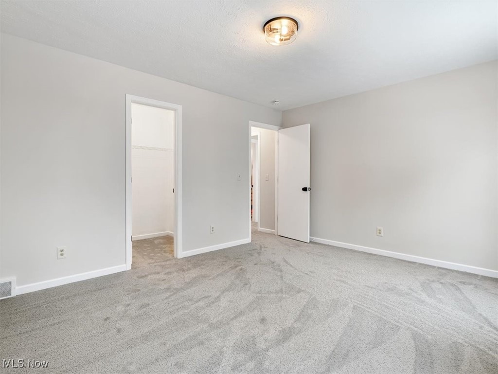 6691 Morley Road Painesville, OH 44077 - Photo 29 of 48 3rd upstairs bedroom with walk in closet