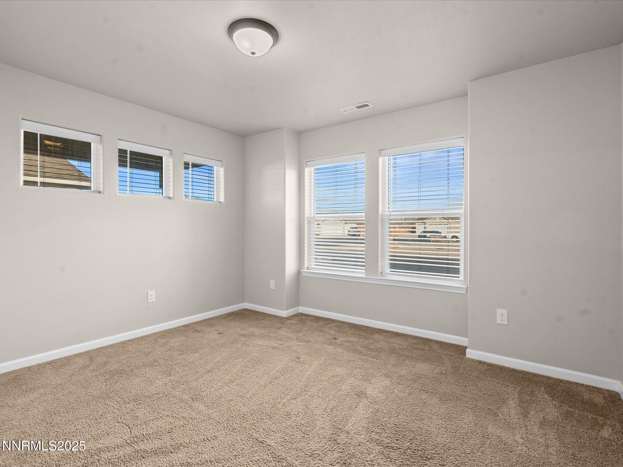 2541 Milano Way Fallon, NV 89406 - Photo 27 of 47 a view of an empty room with a window