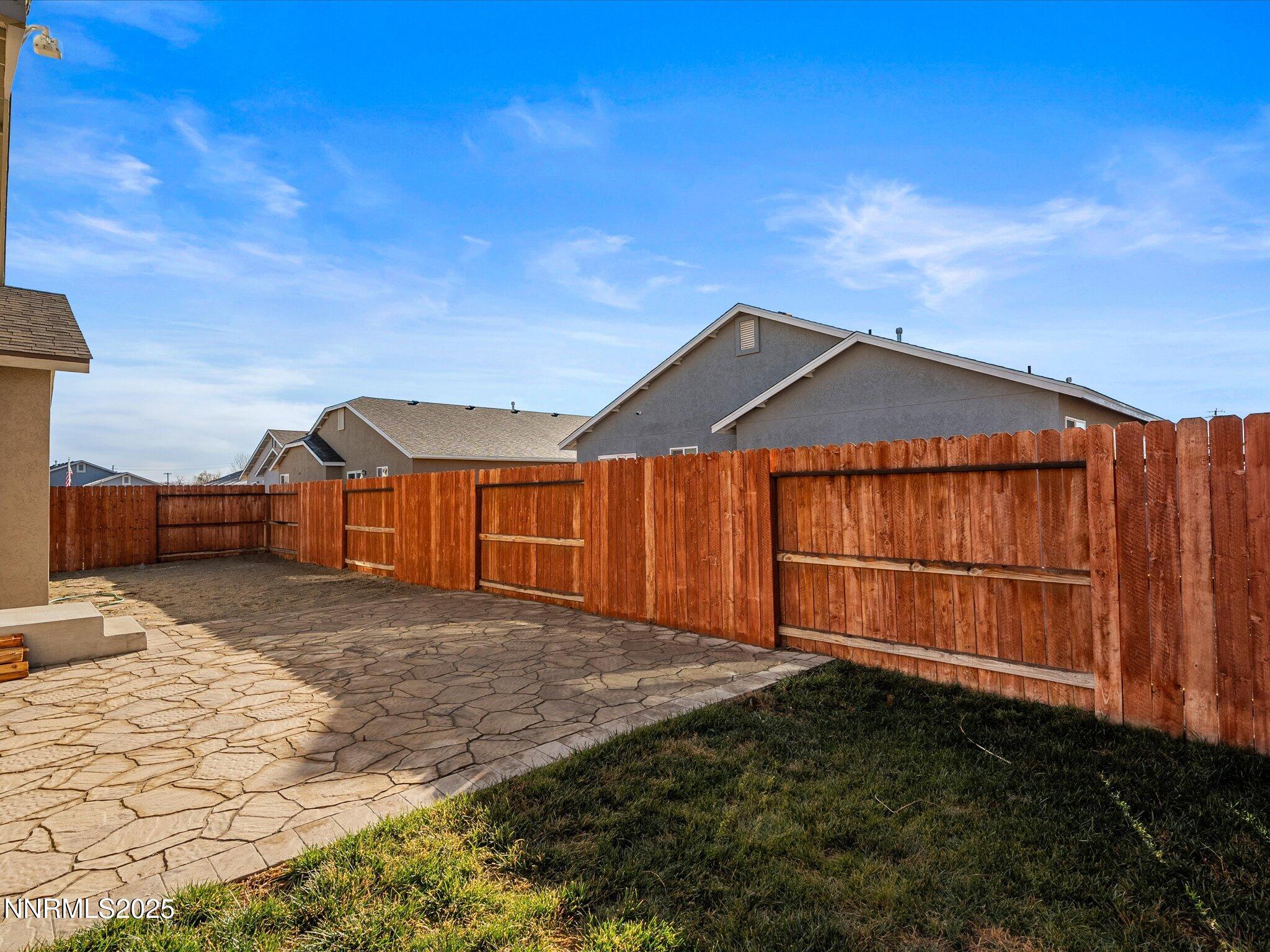 2541 Milano Way Fallon, NV 89406 - Photo 33 of 47 a front view of a house with a yard