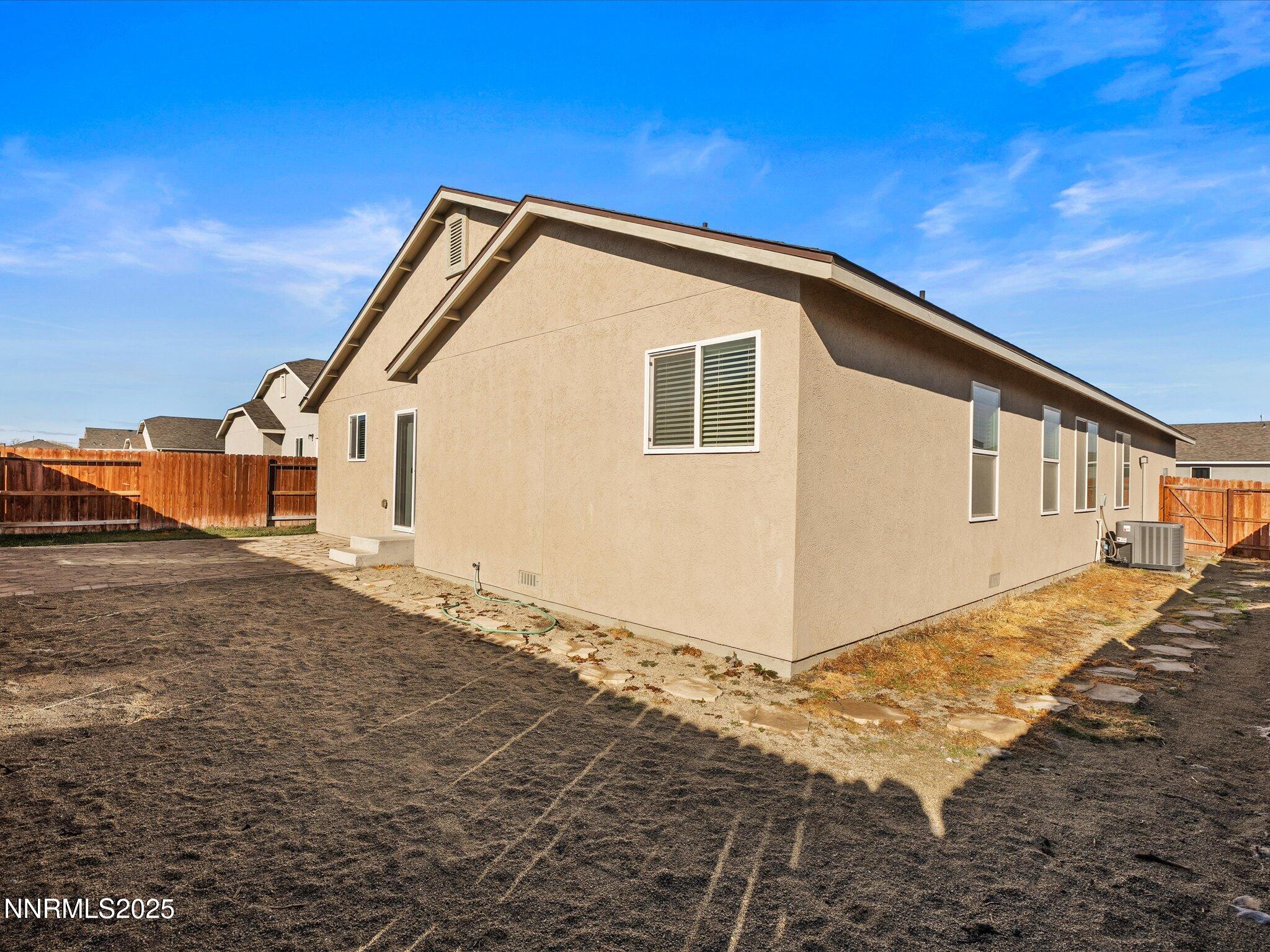 2541 Milano Way Fallon, NV 89406 - Photo 35 of 47 a view of a house with a yard