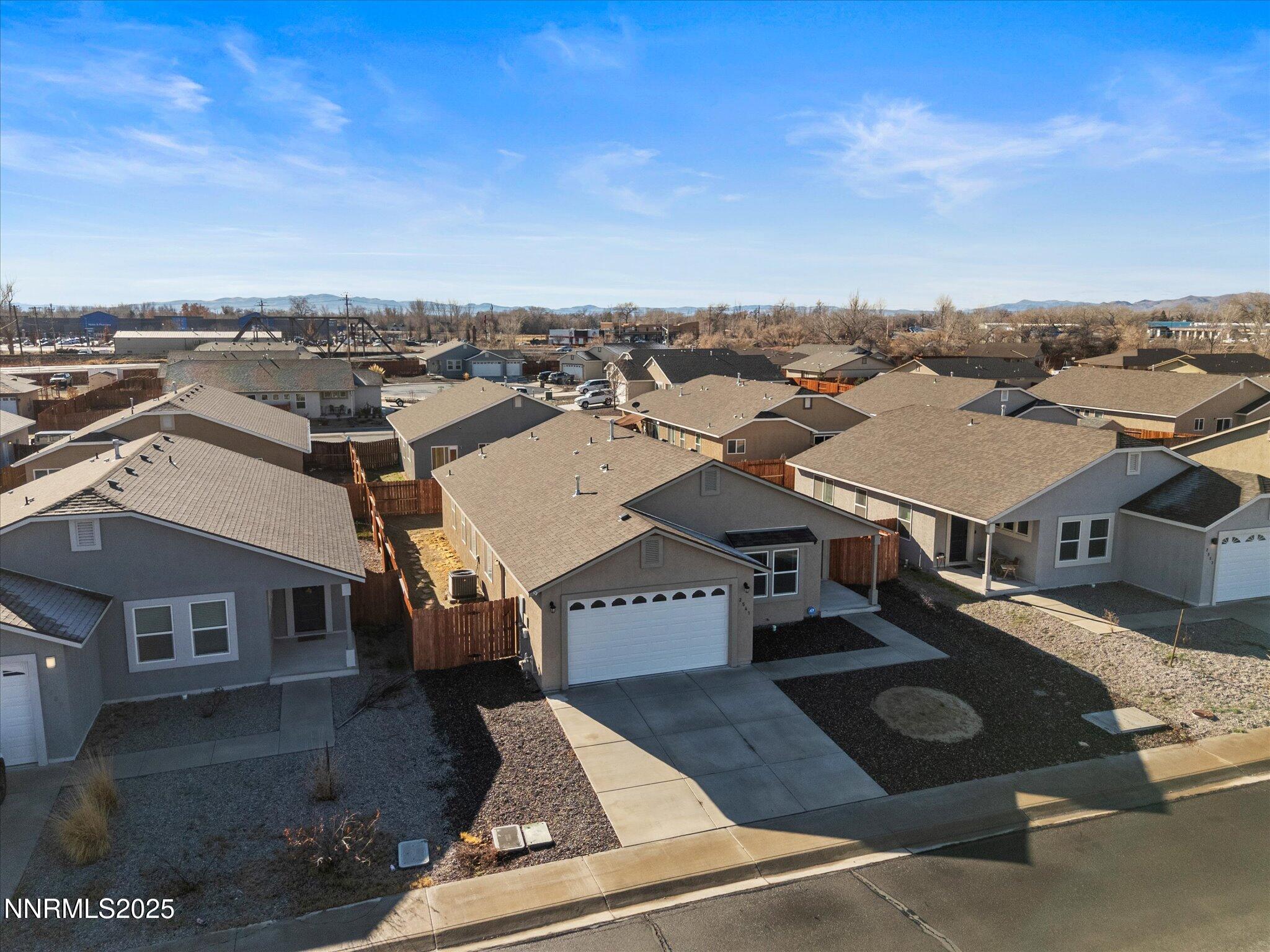 2541 Milano Way Fallon, NV 89406 - Photo 38 of 47 an aerial view of a house with a yard