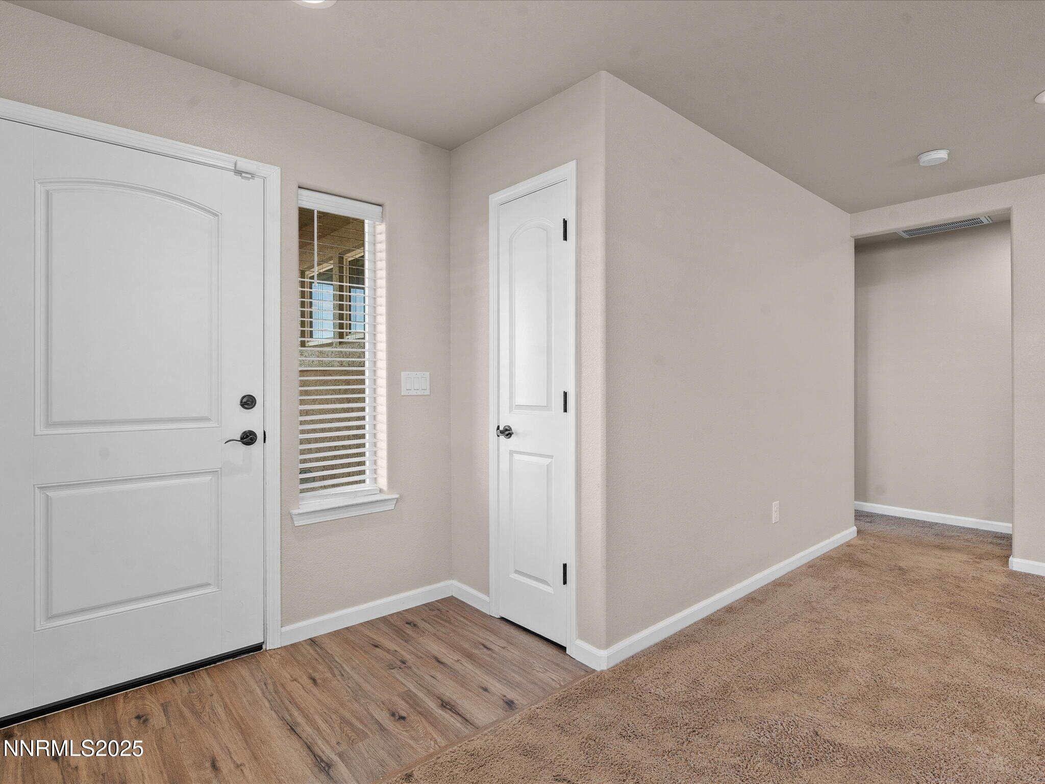 2541 Milano Way Fallon, NV 89406 - Photo 4 of 47 an empty room with windows