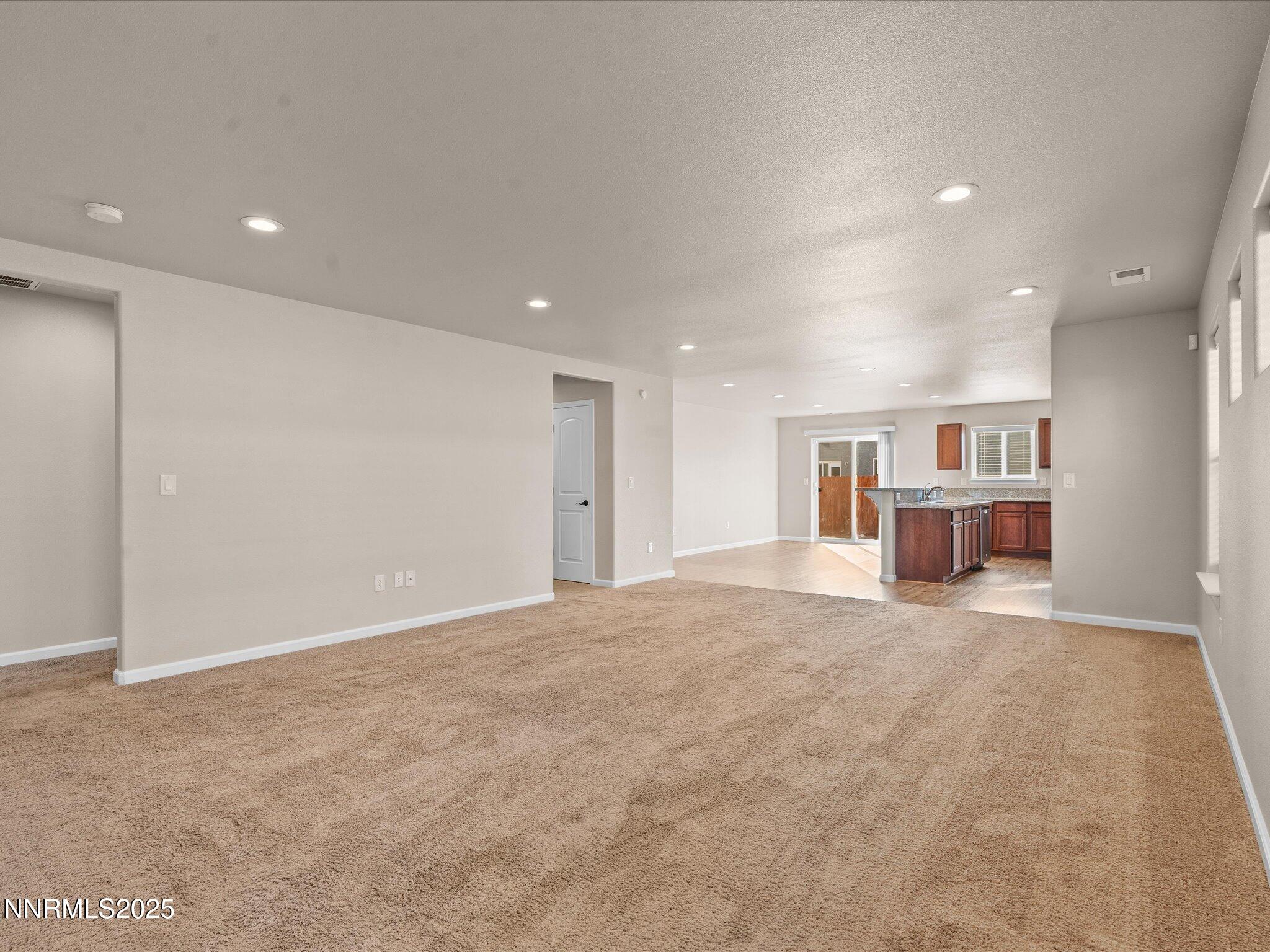 2541 Milano Way Fallon, NV 89406 - Photo 5 of 47 a view of a livingroom with furniture and natural light