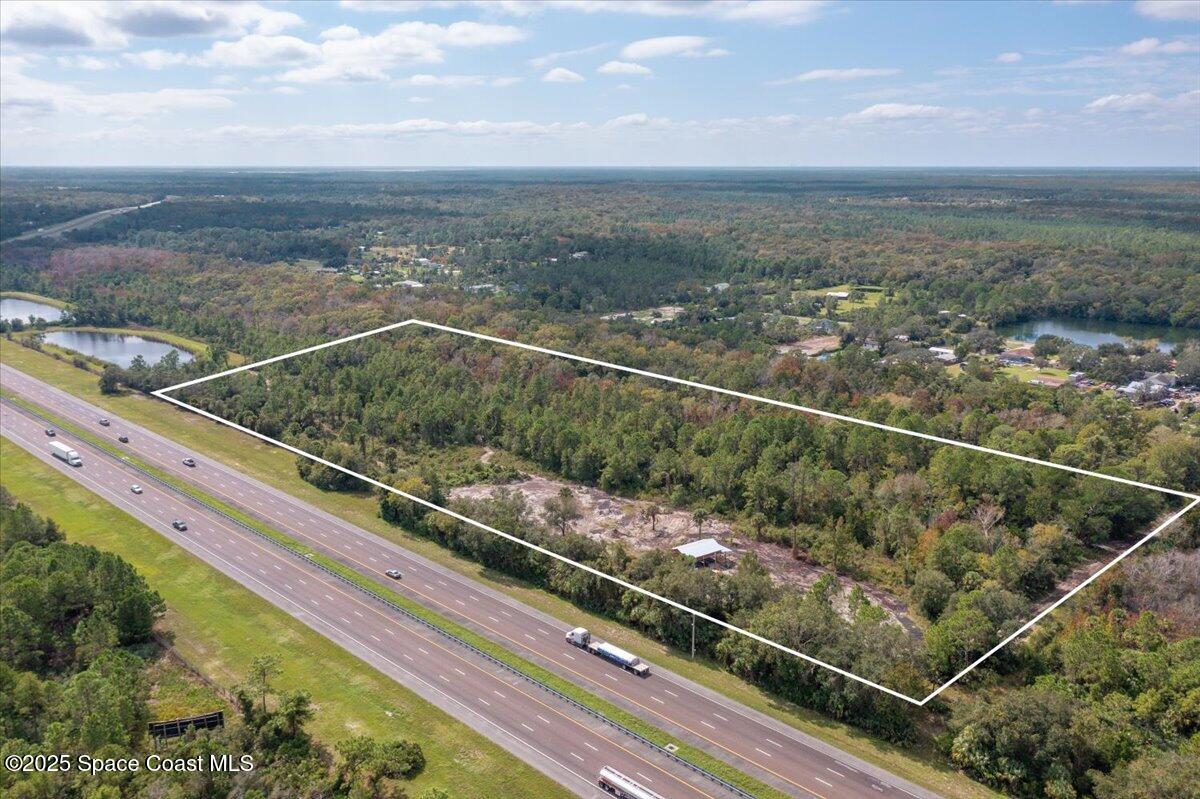 0 Blounts Ridge Road Mims, FL 32754 - Photo 9 of 9 a view of a city from a balcony