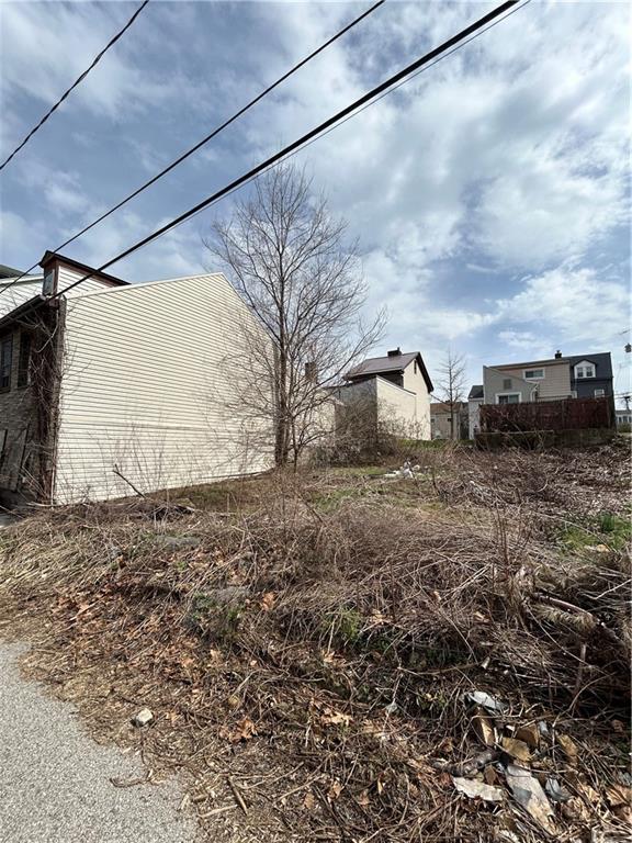 0 Lovitt Pittsburgh, PA 15212 - Photo 2 of 7 a view of a dry yard with wooden fence