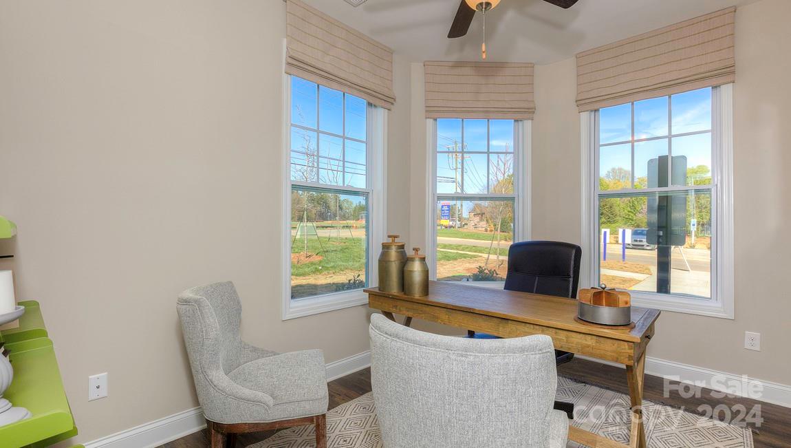271 Creekview Road Hendersonville, NC 28792 - Photo 5 of 36 a view of a workspace with furniture and a window