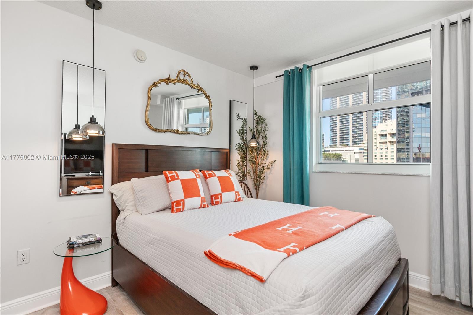 1250 South Miami Avenue, Unit 1206 Miami, FL 33130 - Photo 11 of 19 a bedroom with a large bed and a window