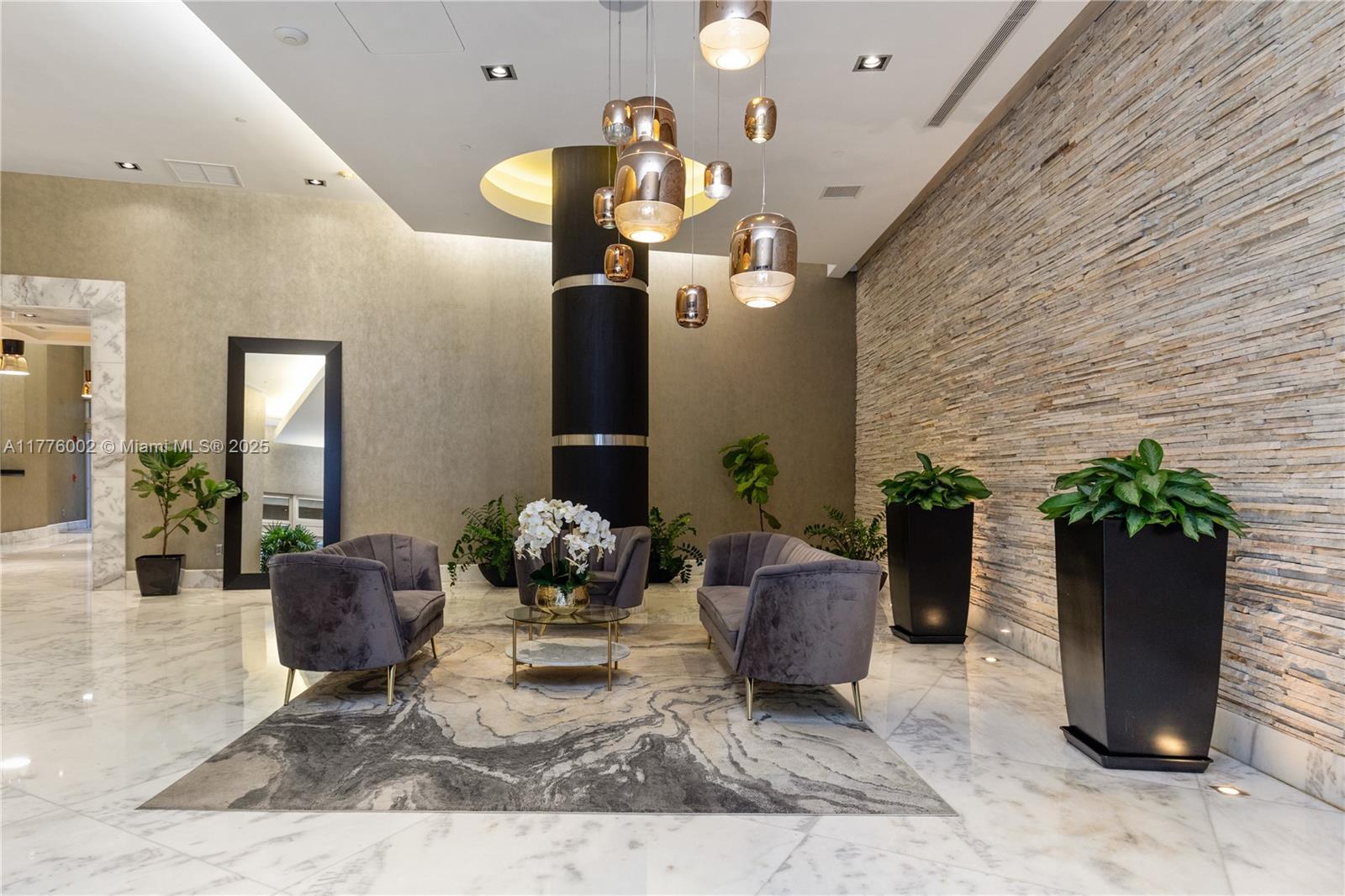1250 South Miami Avenue, Unit 1206 Miami, FL 33130 - Photo 14 of 19 a dining room with furniture and a potted plant