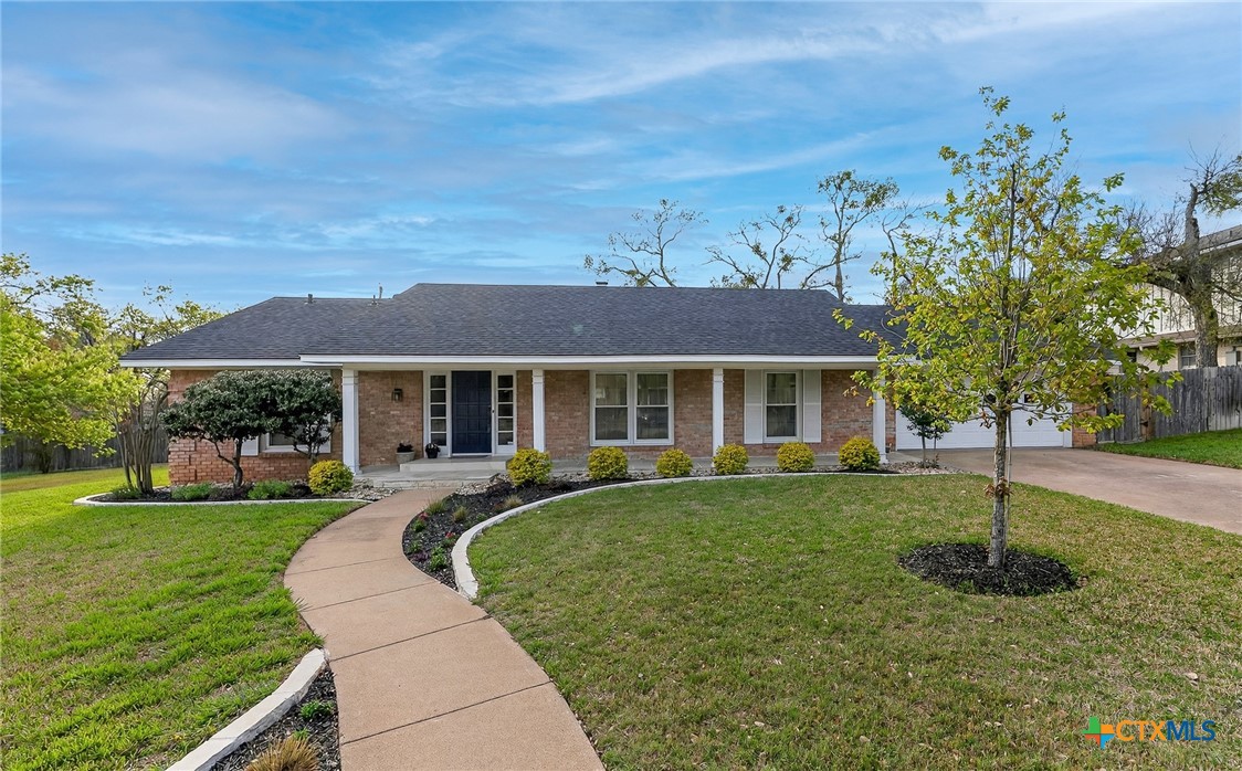 3102 Las Cruces Boulevard Temple, TX 76502 - Photo 1 of 37 a front view of a house with a yard