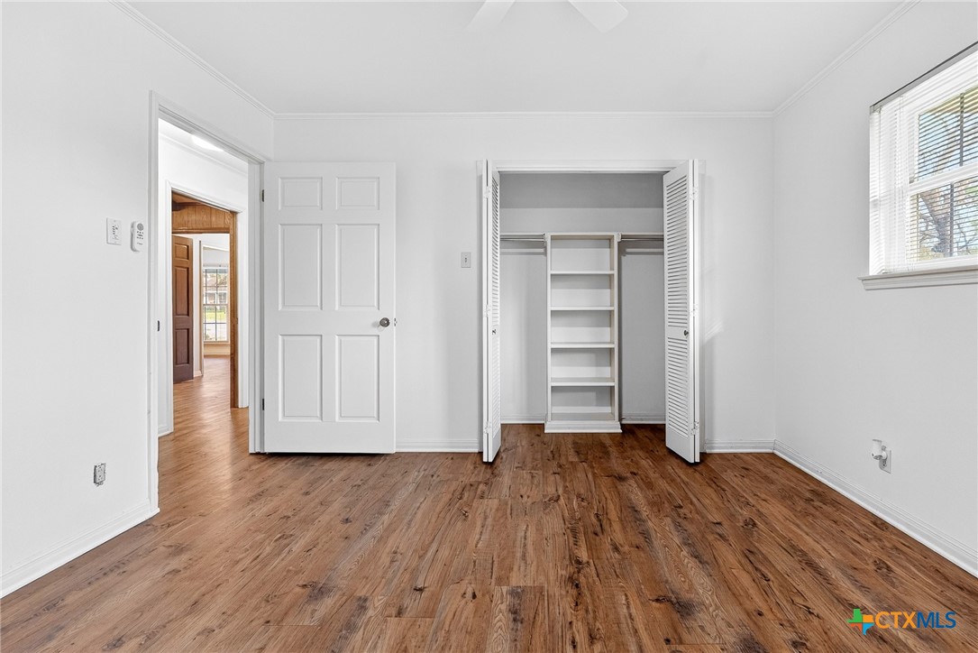3102 Las Cruces Boulevard Temple, TX 76502 - Photo 27 of 37 an empty room with wooden floor & closet area