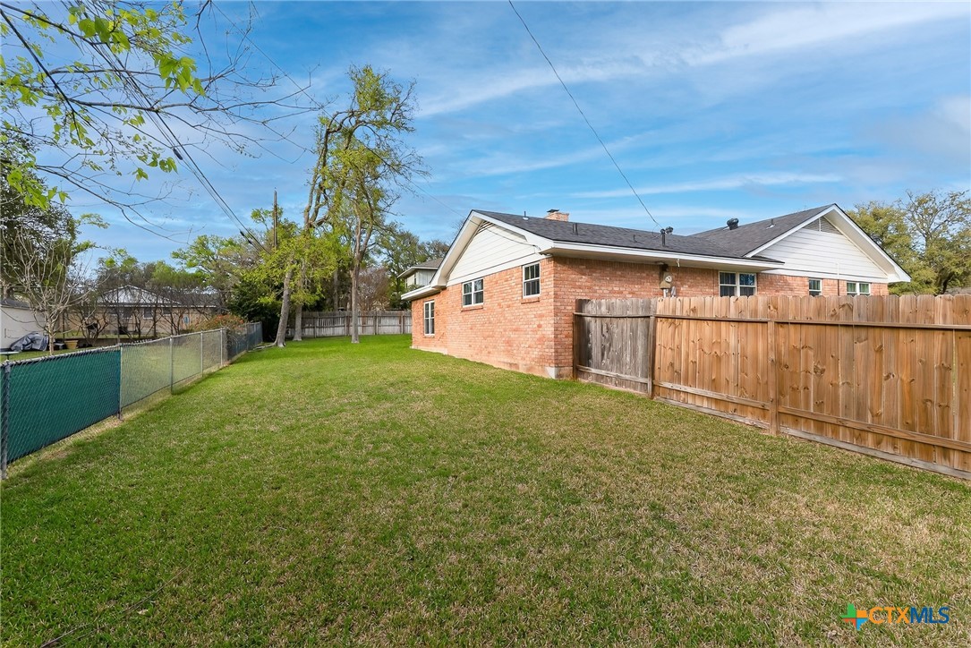 3102 Las Cruces Boulevard Temple, TX 76502 - Photo 34 of 37 a view of a backyard with a garden