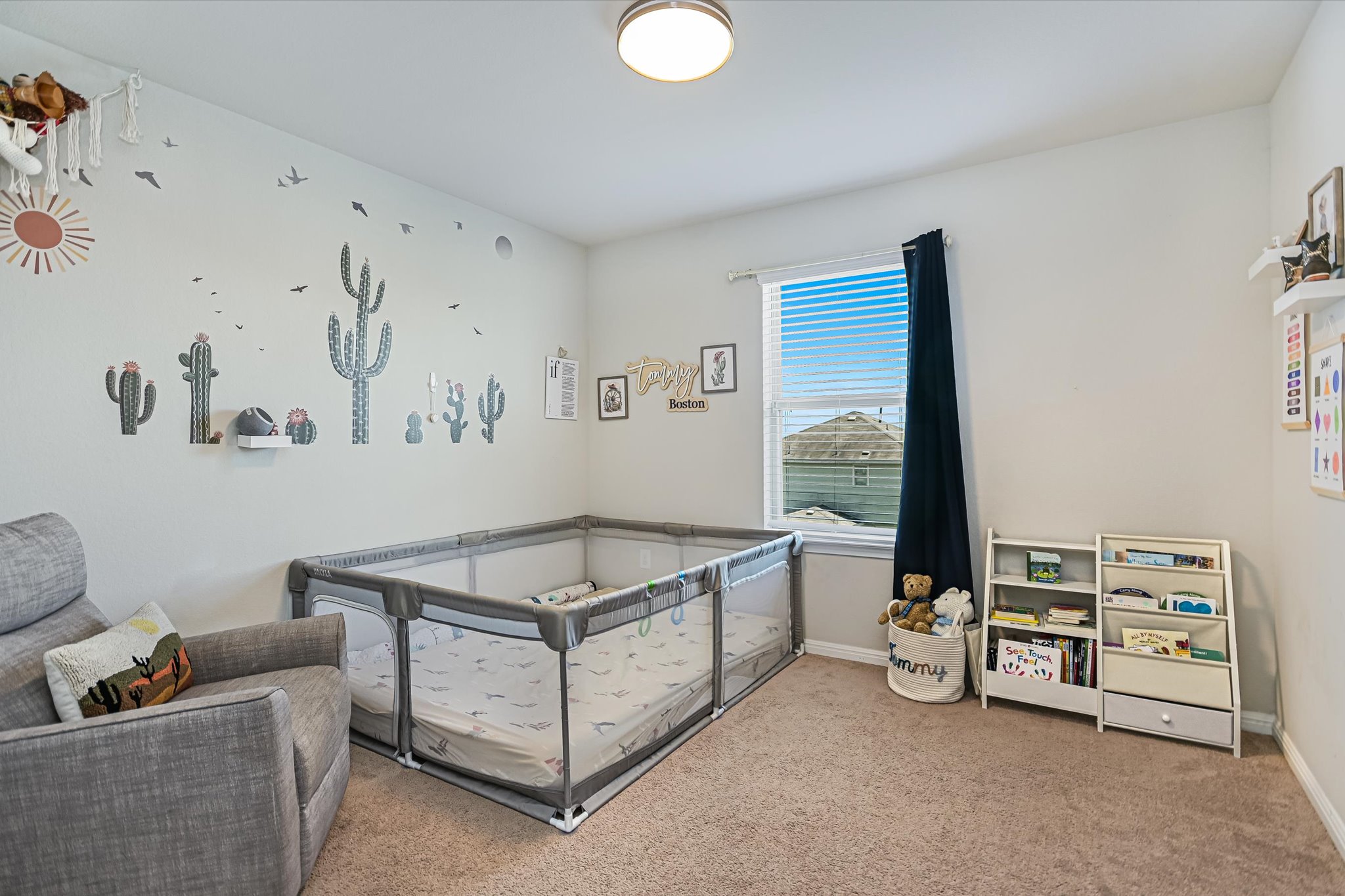 225 Vestral Road Buda, TX 78610 - Photo 11 of 24 Currently dressed for the sweetest chapter, this room is ready for its next story. A nursery today, a big-kid bedroom tomorrow or simply a cozy space for guests, hobbies and life's next chapter.