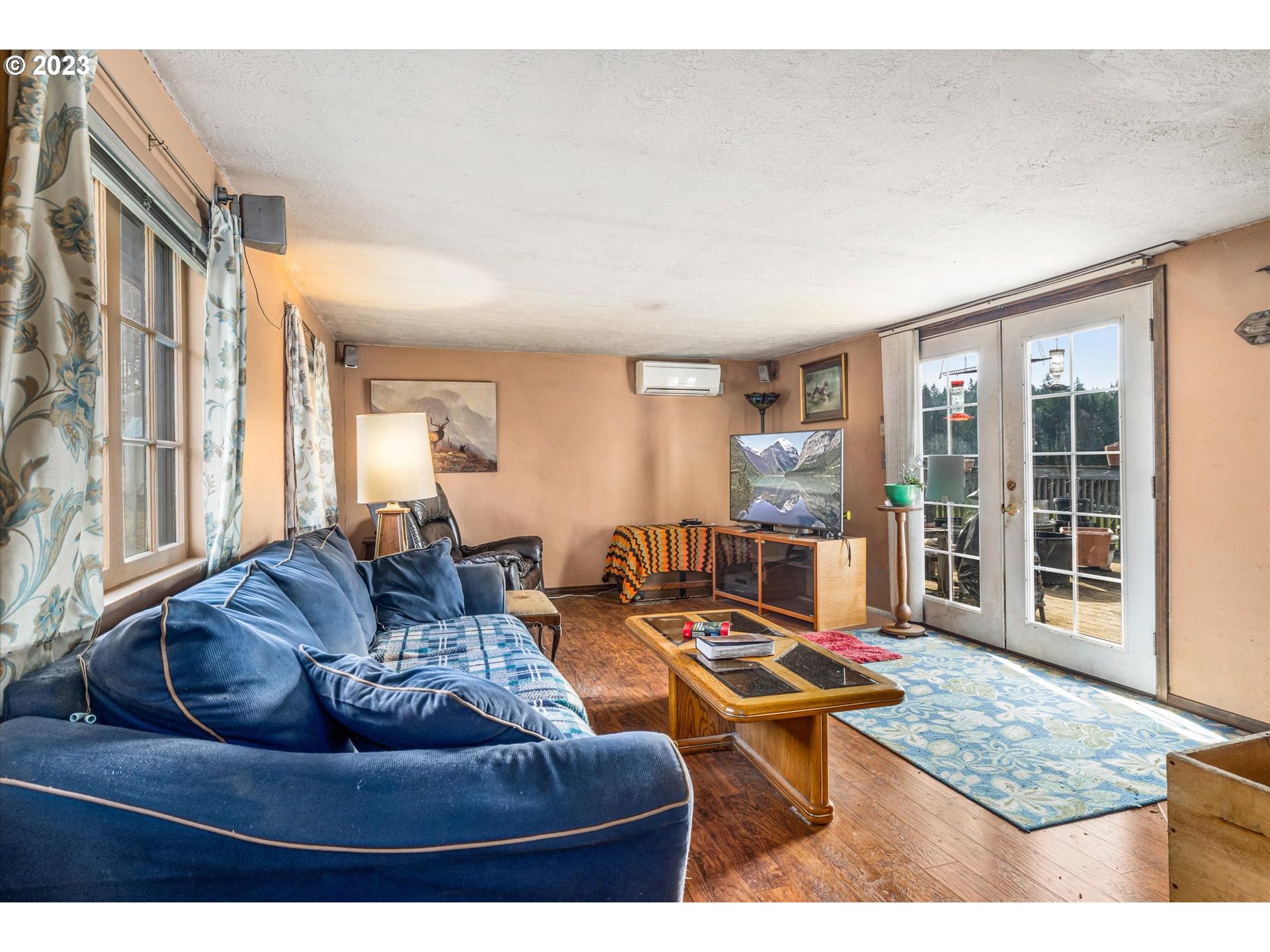 39400 Southeast Trubel Road Sandy, OR 97055 - Photo 12 of 34 a living room with furniture and a window